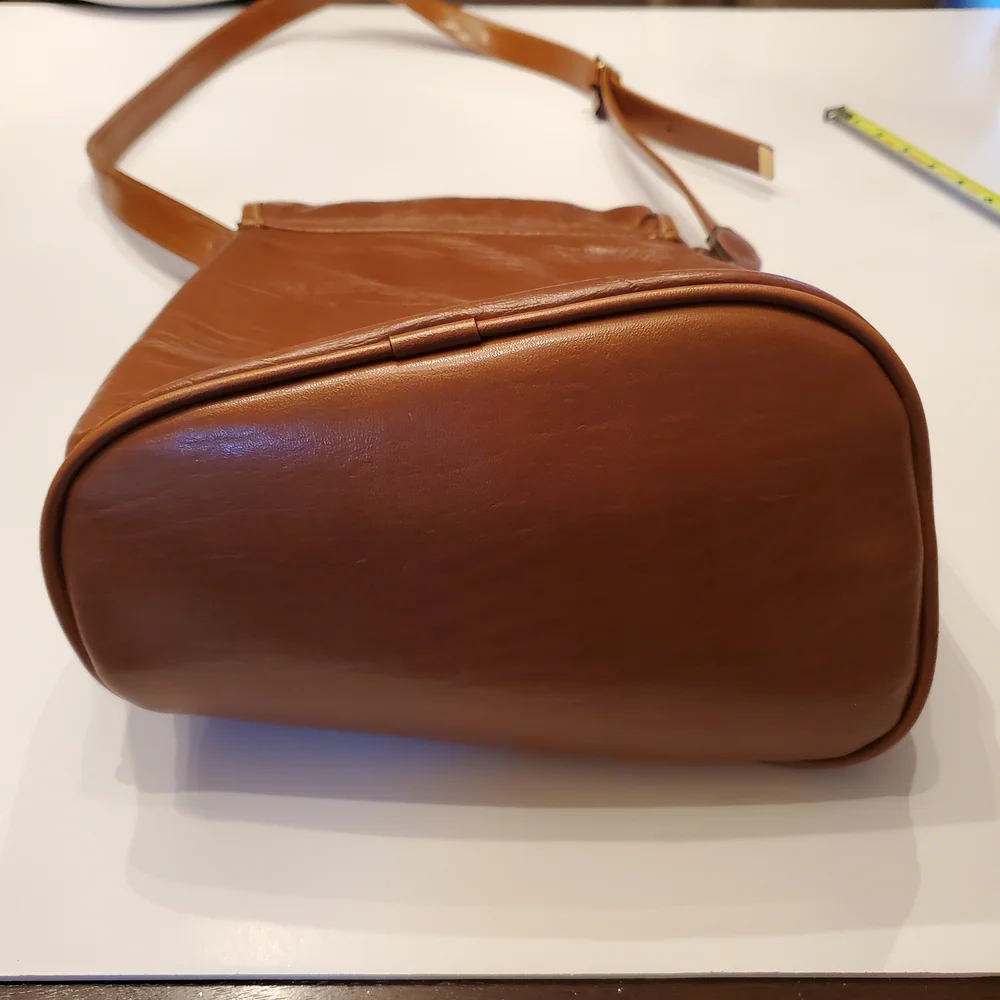 Vintage Capezio Cognac Bucket Crossbody Bag – Classic Gold Medallion